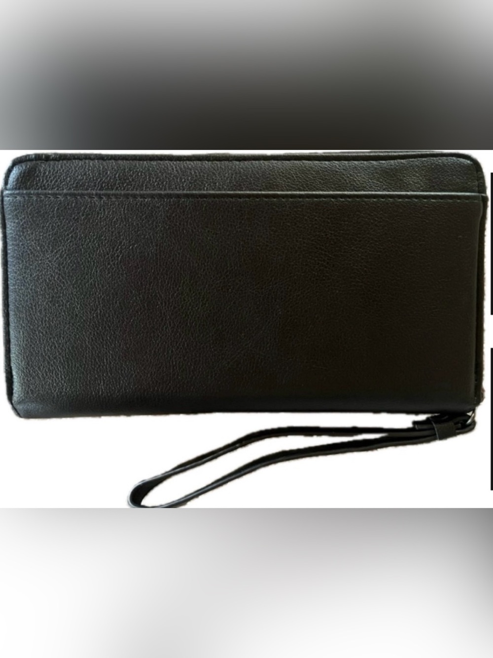 No Boundaries wallet/wristlet. New with tags. Plenty of space for your needs.